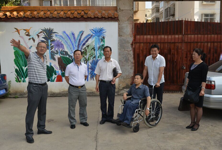 图为省残联领导到beat365调研（一）